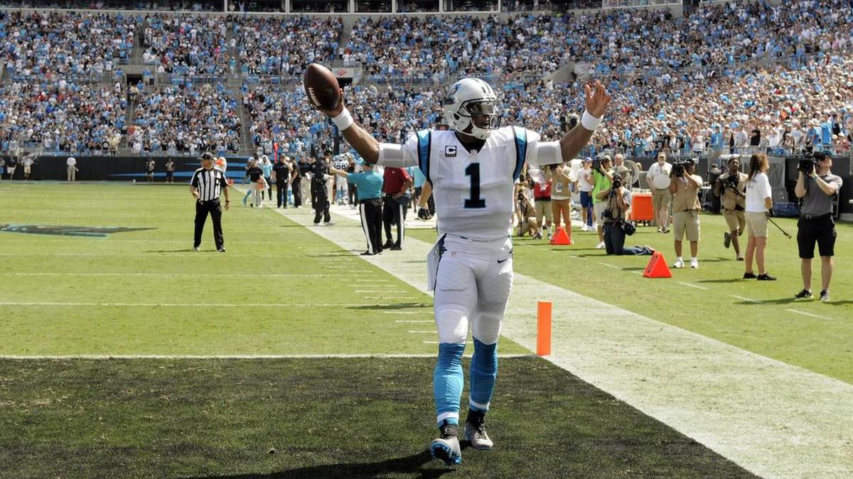 Carolina Panthers' Cam Newton (1) celebrates after a touchdown against the San Francisco 49ers in the first half of an NFL football game in Charlotte, N.C., Sunday, Sept. 18, 2016.