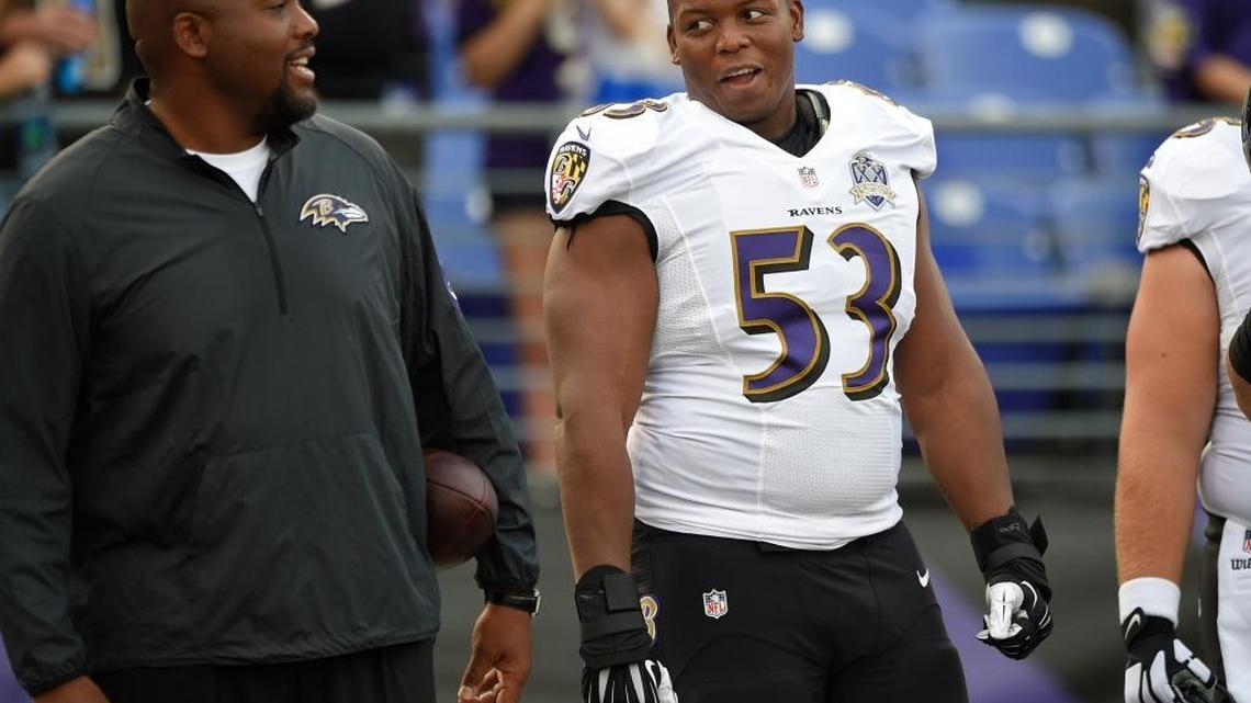 Baltimore Ravens center Jeremy Zuttah (53) looks on before an NFL preseason football game against the New Orleans Saints, Thursday, Aug. 13, 2015, in Baltimore.
