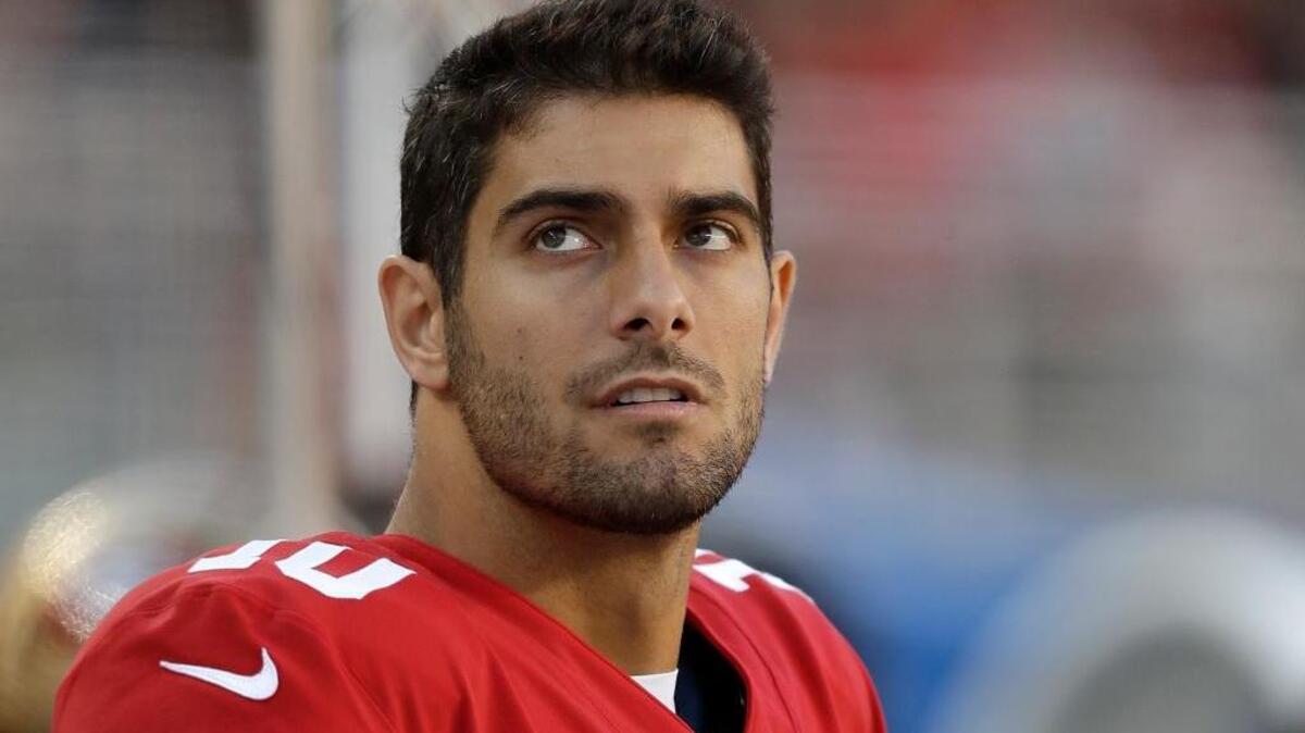 San Francisco 49ers quarterback Jimmy Garoppolo (10) stands on the sideline during the second half of an NFL football game against the Arizona Cardinals in Santa Clara, Calif., Sunday, Nov. 5, 2017.