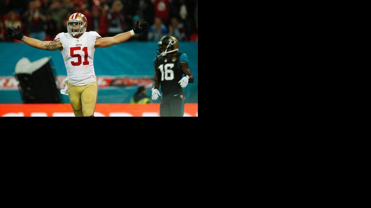 
Dan Skuta celebrates after a touchdown return in London in 2013
