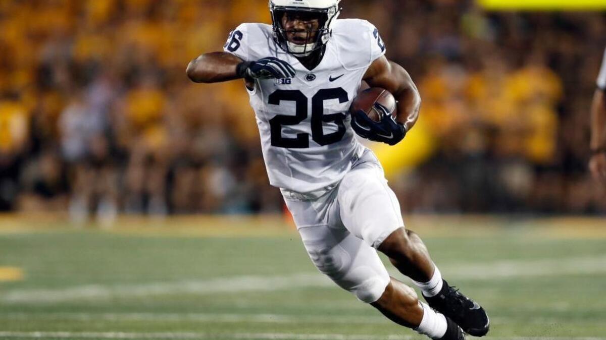 Penn State running back Saquon Barkley runs with the ball during the first half of an NCAA college football game against Iowa Saturday, Sept. 23, 2017, in Iowa City, Iowa.