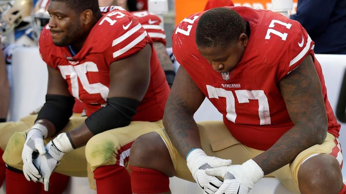 San Francisco 49ers offensive guard Laken Tomlinson (75) and offensive tackle Trent Brown (77) sit on the bench during the second half of an NFL football game against the Arizona Cardinals in Santa Clara, Calif., Sunday, Nov. 5, 2017.