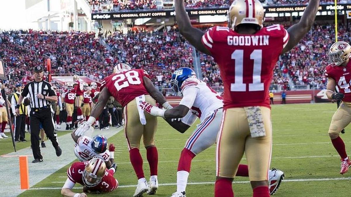 Marquise Goodwin (11) celebrates after a touchdown by C.J. Beathard in the third quarter. He said his wife encouraged him to play in the game.