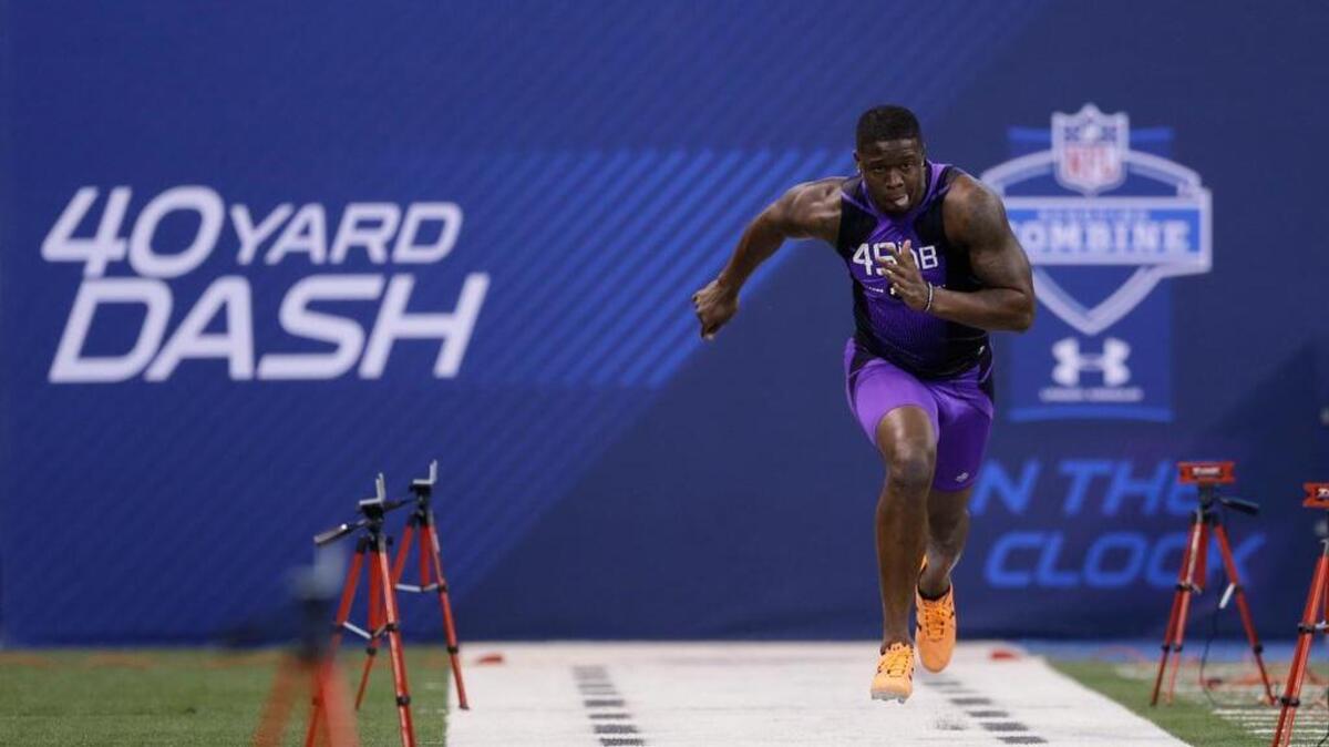 
Samford defensive back Jaquiski Tartt runs the 40-yard dash at the scouting combine in Indianapolis on Feb. 23.
