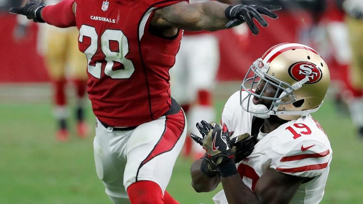 Arizona Cardinals cornerback Justin Bethel (28) breaks up a pass intended for San Francisco 49ers wide receiver Aldrick Robinson (19) during the second half of an NFL football game, Sunday, Oct. 1, 2017, in Glendale, Ariz.