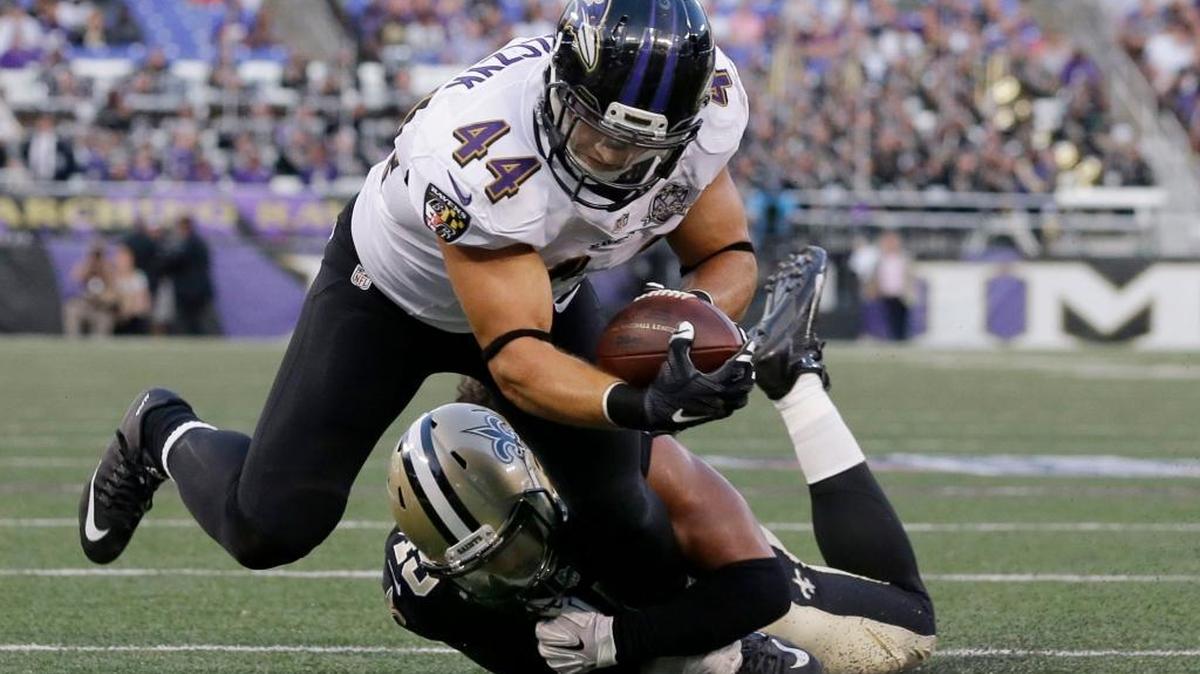In this Aug. 13, 2015, file photo, New Orleans Saints outside linebacker Hau'oli Kikaha, bottom, stops Baltimore Ravens fullback Kyle Juszczyk (44) during the first half of an NFL preseason football game in Baltimore.