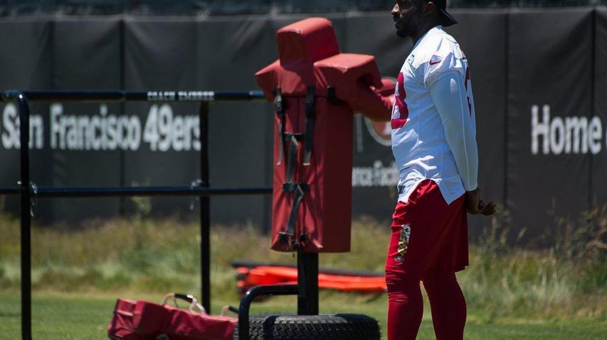 Elvis Dumervil watches defensive team during the San Francisco 49ers practice at Levi's Stadium on June 13 in Santa Clara.