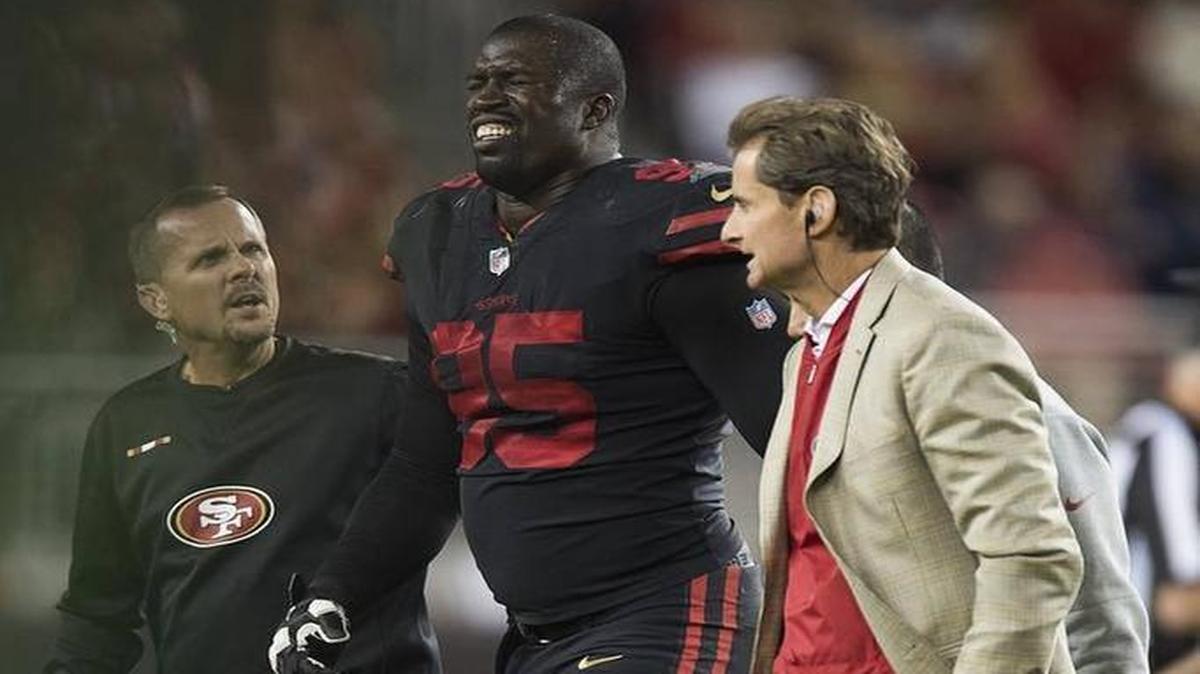 Tank Carradine leaves the field after the 49ers defensive end was injured in Thursday’s game against the Los Angeles Rams. Carradine on Monday was placed on injured reserve.