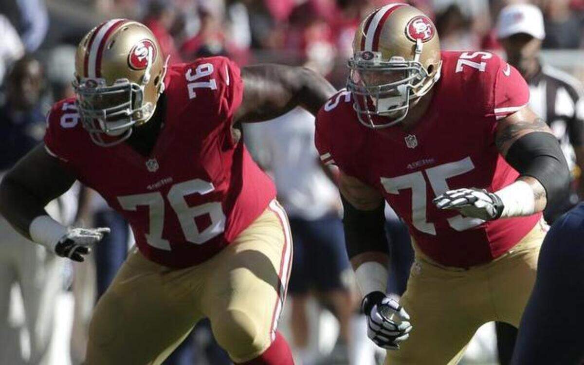 
San Francisco 49ers offensive tackle Anthony Davis (76), looking for blocking opportunities with teammate Alex Boone (75), says suffering a concussion in a game against the New York Giants was a frightening experience.
