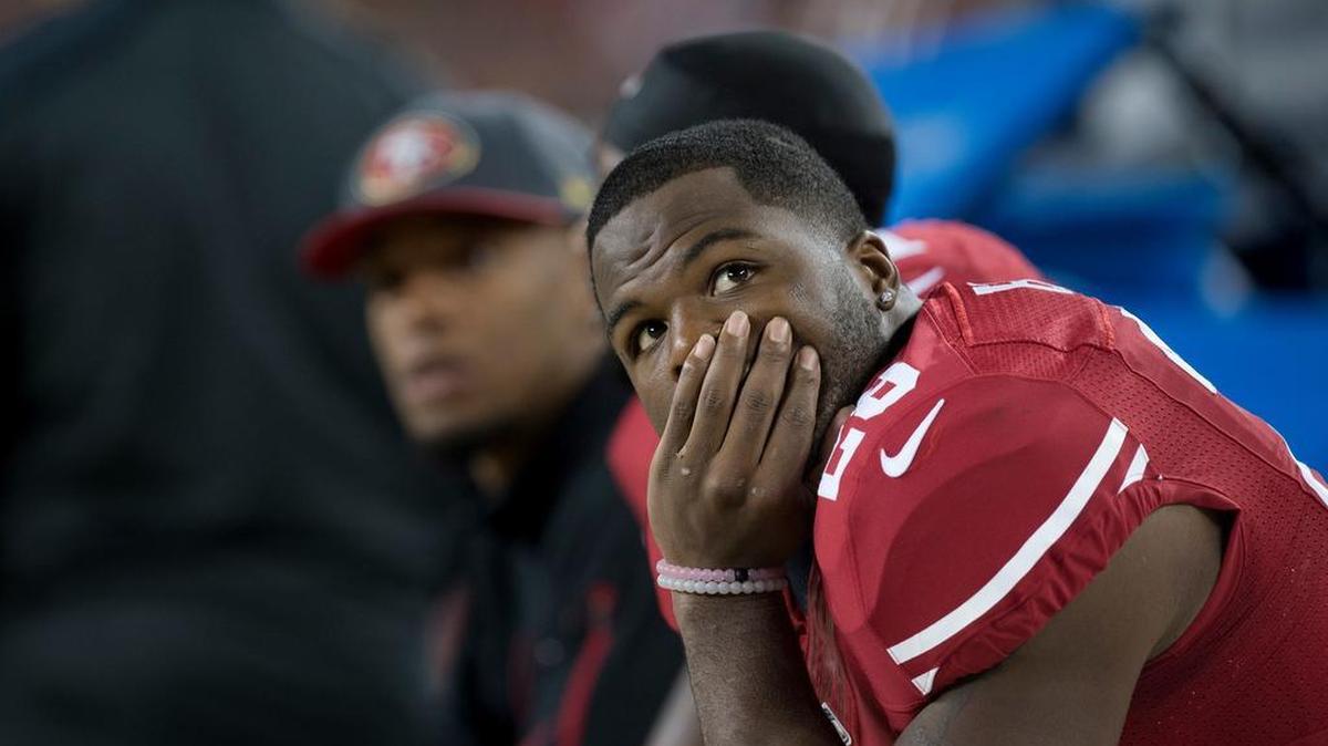 San Francisco running back Carlos Hyde checks the scoreboard in the final minutes in the 49ers’ 20-3 loss to the Seattle Seahawks on Thursday at Levi’s Stadium.