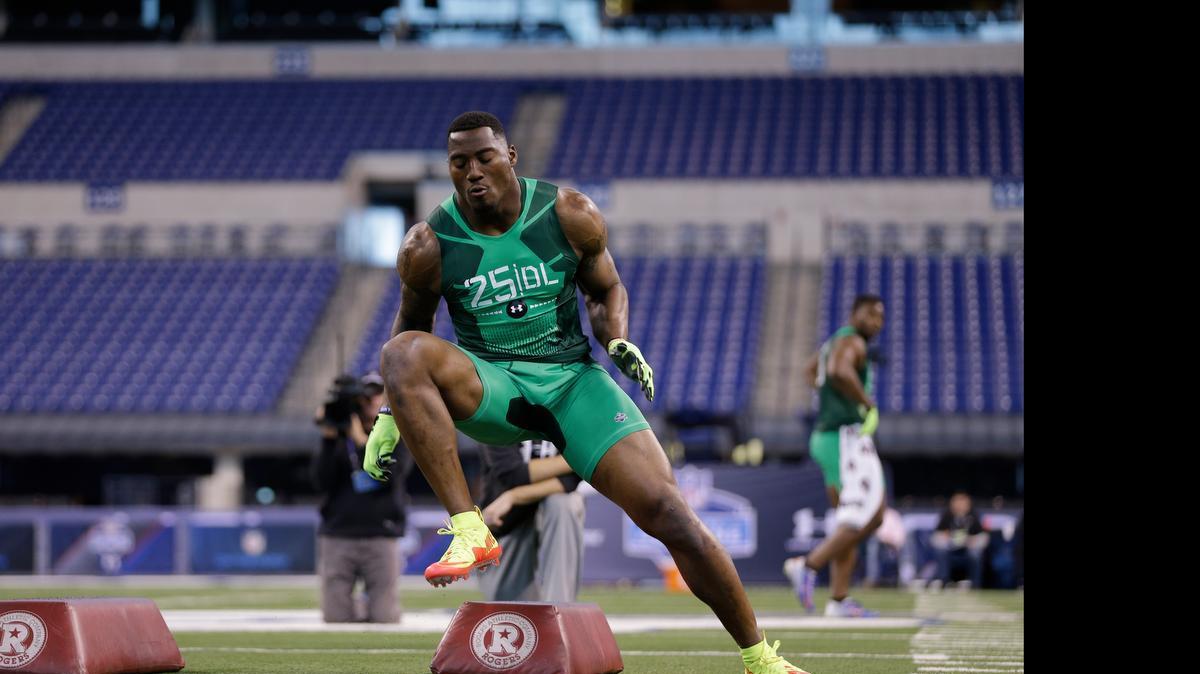 
Virginia defensive lineman Eli Harold runs a drill at the NFL football scouting combine in Indianapolis in February.
