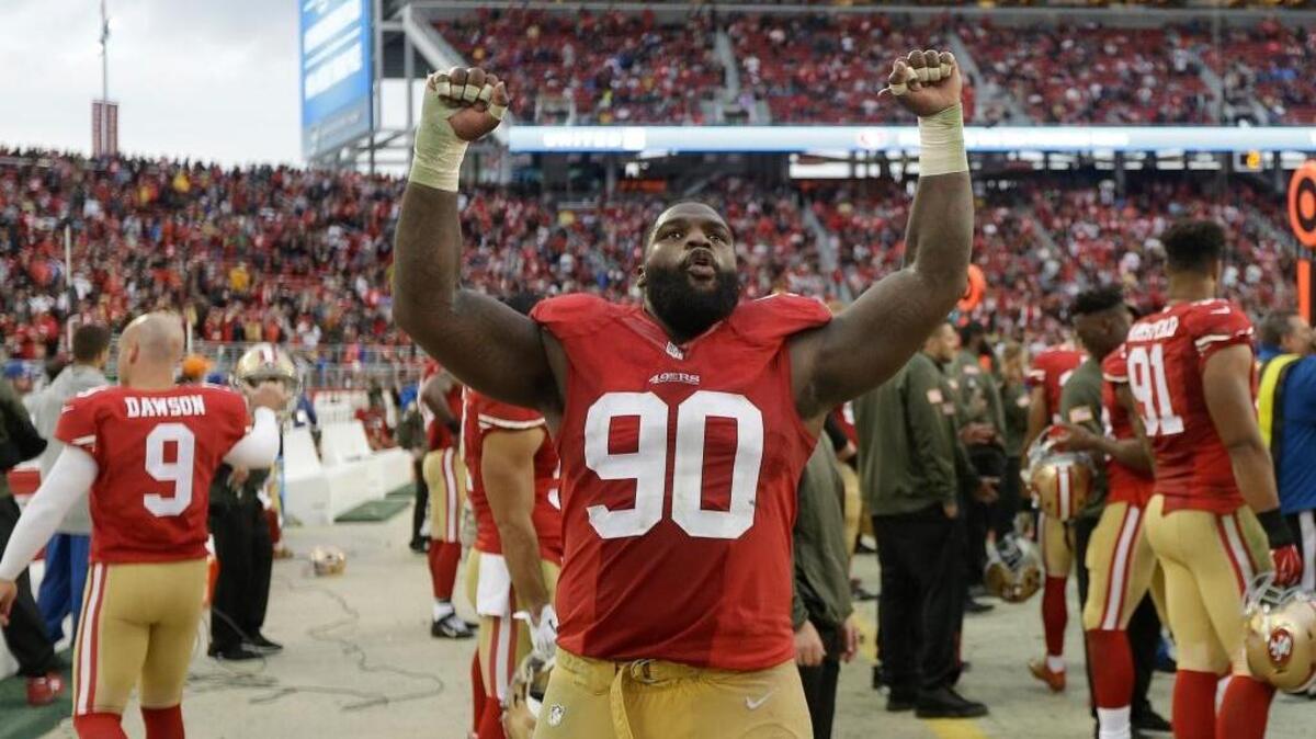San Francisco 49ers nose tackle Glenn Dorsey (90) celebrates during the second half of an NFL football game against the Atlanta Falcons in Santa Clara, Calif., Sunday, Nov. 8, 2015. The 49ers won 17-16.