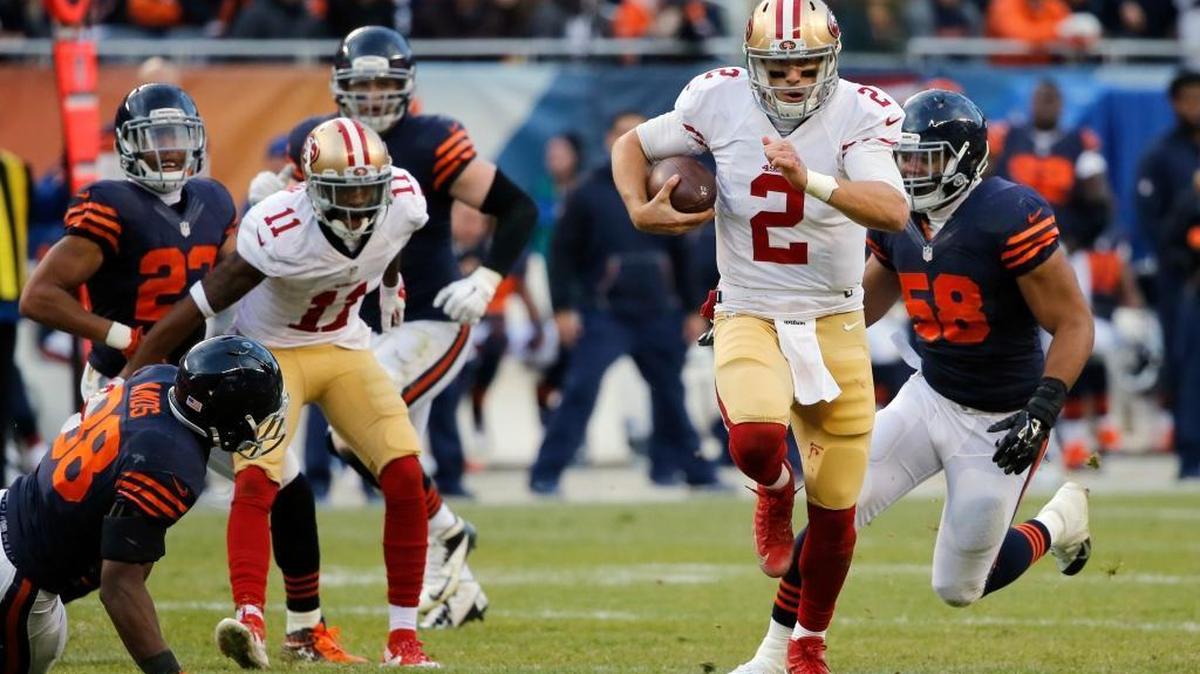 San Francisco 49ers quarterback Blaine Gabbert (2) runs to the end zone for a touchdown during the second half of an NFL football game against the Chicago Bears, Sunday, Dec. 6, 2015, in Chicago.