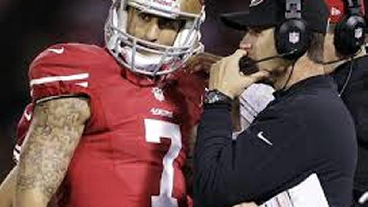 Jim Harbaugh defended Colin Kaepernick Friday, saying the 49ers quarterback will flourish in coming seasons.