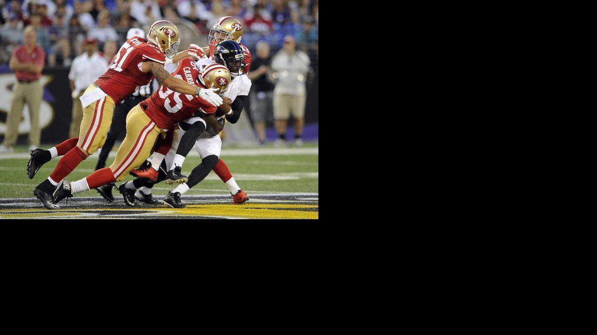 
Jim Tomsula said he’s excited about the strides Tank Carradine (95) made last season.
