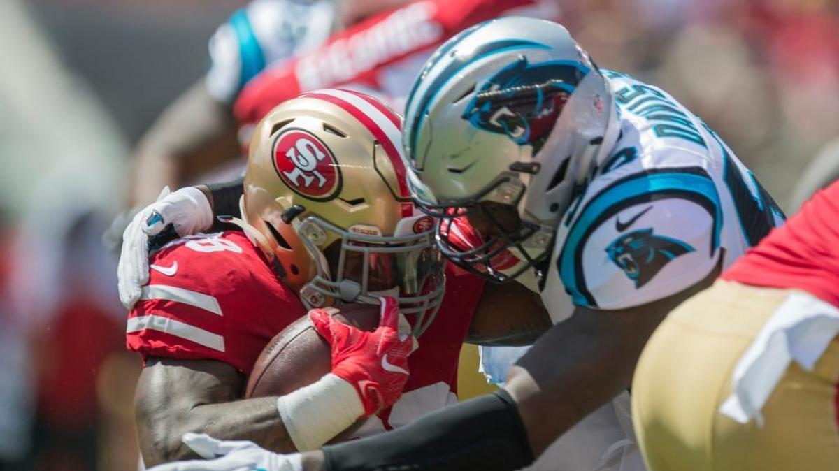 Carolina Panther Thomas Davis stops Carlos Hyde for no gain in the first quarter of the NFL game between the San Francisco 49ers and Carolina Panthers on Sunday, Sept. 10, 2017 at Levi’s Stadium in Santa Clara.