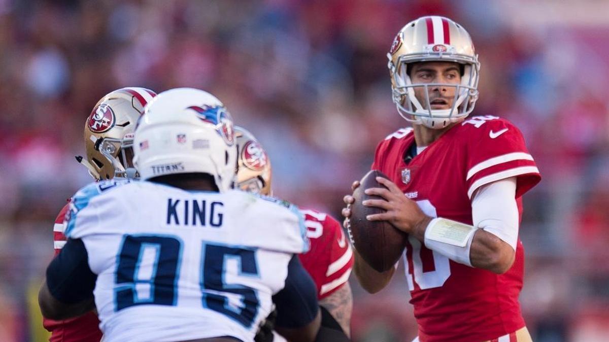 49ers quarterback Jimmy Garoppolo looks for open receiver on a second quarter drive again the Tennessee Titans during a game at Levi's Stadium in Santa Clara, Calif. on Sunday December 17, 2017.