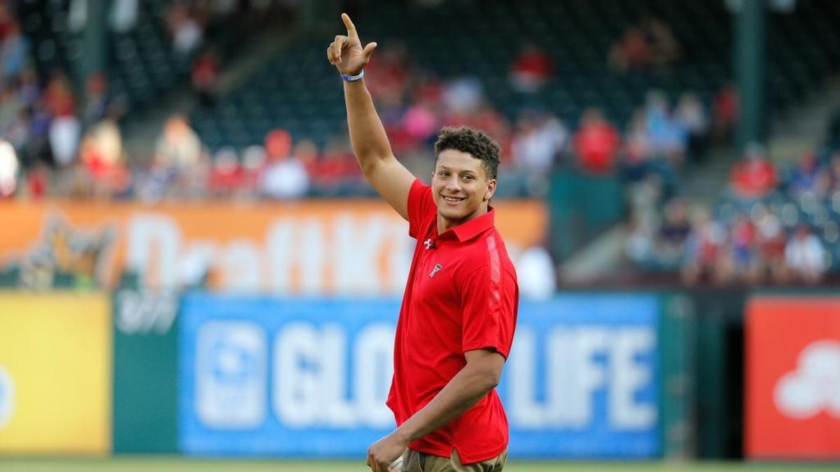 Texas Tech quarterback Patrick Mahomes, acknowledging cheers after throwing out the first pitch at a game between the Toronto Blue Jays and Texas Rangers in 2016, is the latest top college passer to be scouted by the San Francisco 49ers.
