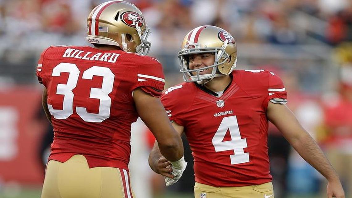 
San Francisco 49ers kicker Corey Acosta (4) is congratulated after kicking a field goal by fullback Trey Millard (33) during the second half of an NFL preseason football game against the Dallas Cowboys in Santa Clara, Calif., Sunday, Aug. 23, 2015.
