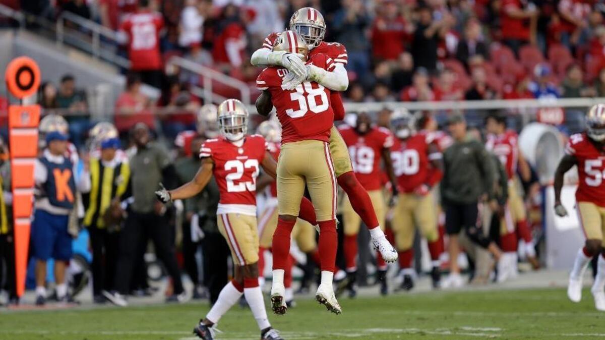 Defensive back Adrian Colbert (38) and linebacker Reuben Foster (56) celebrate during the 49ers’ win over the New York Giants on Nov. 12 in Santa Clara. The rookies came up big in Sunday’s win over the Houston Texans.