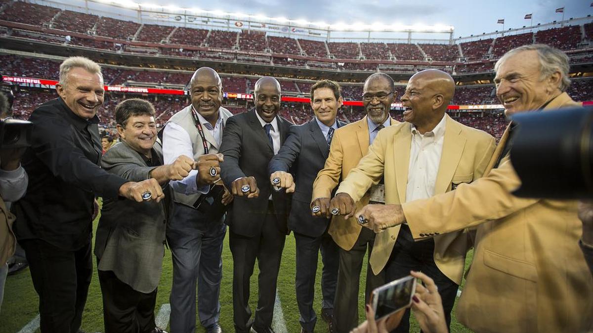 
San Francisco 49ers hall of famers Joe Montana, former owner Eddie DeBartaolo, Jr., Charles Haley, Jerry Rice, Steve Young, Jimmy Johnson, Ronnie Lott and Dave Wilcox are honored before the season opening game at Levi's Stadium on Monday September 14, 2015 in Santa Clara.
