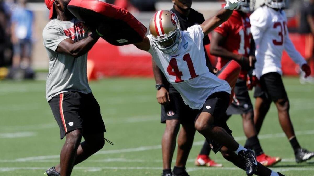 Cornerback Ahkello Witherspoon goes through drills at 49ers training camp on July 28. The Christian Brothers High School graduate got his first career interception Sunday in a loss to the Eagles in Philadelphia.