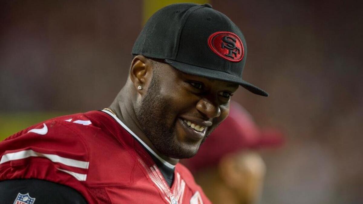 Offensive tackle Anthony Davis looks on during an NFL preseason game against the Green Bay Packers, Friday, Aug. 26, 2016 in Santa Clara. Davis announced Monday he is retiring.