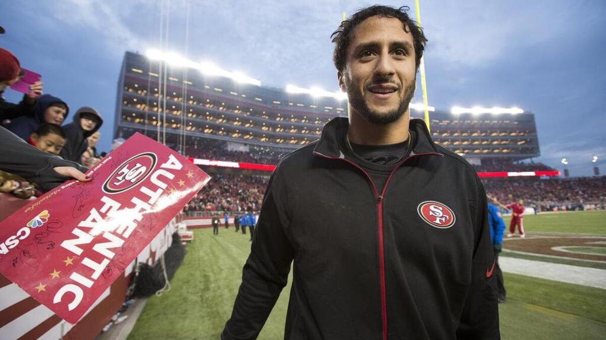 San Francisco 49ers quarterback Colin Kaepernick (7) walks off the field after the 19-16 overtime win over the St. Louis Rams during a game on Sunday January 3, 2016 in Santa Clara.