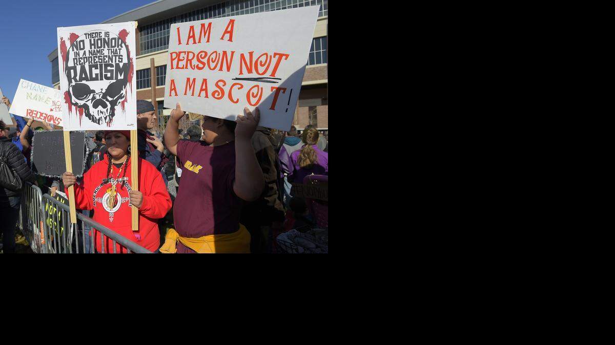 
Protesters gather before a game between the Redskins and Vikings in Minneapolis earlier this month.
