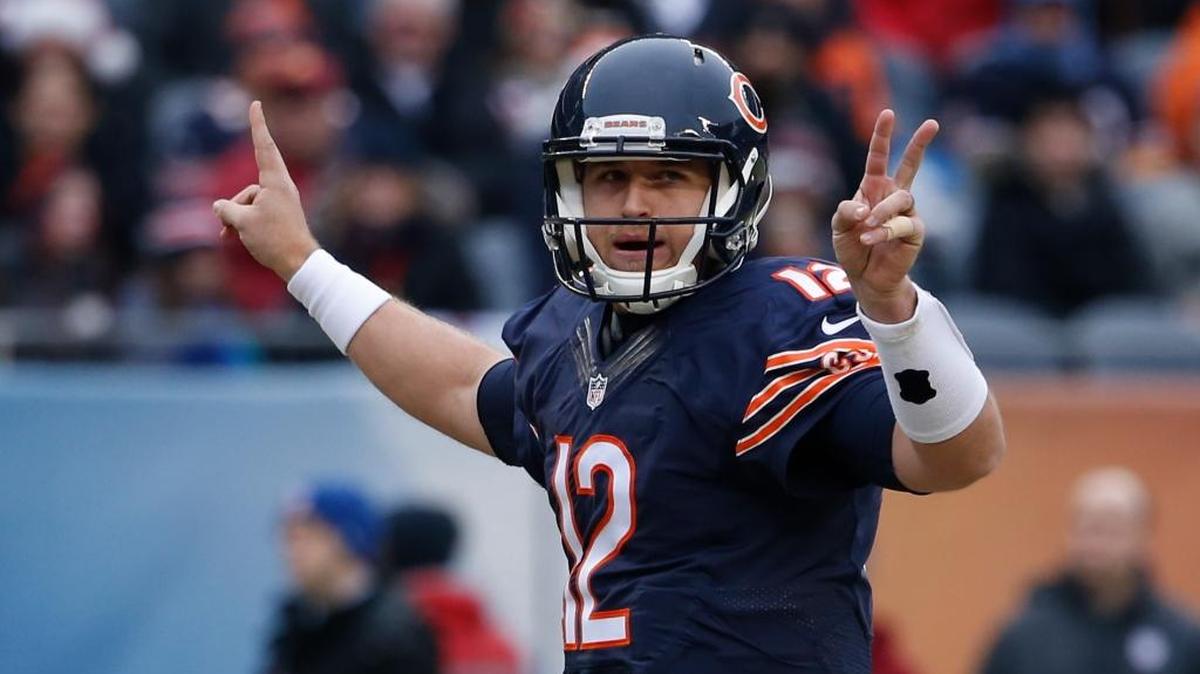 Chicago Bears quarterback Matt Barkley (12) signals against the Washington Redskins during the first half of an NFL football game, Saturday, Dec. 24, 2016, in Chicago.