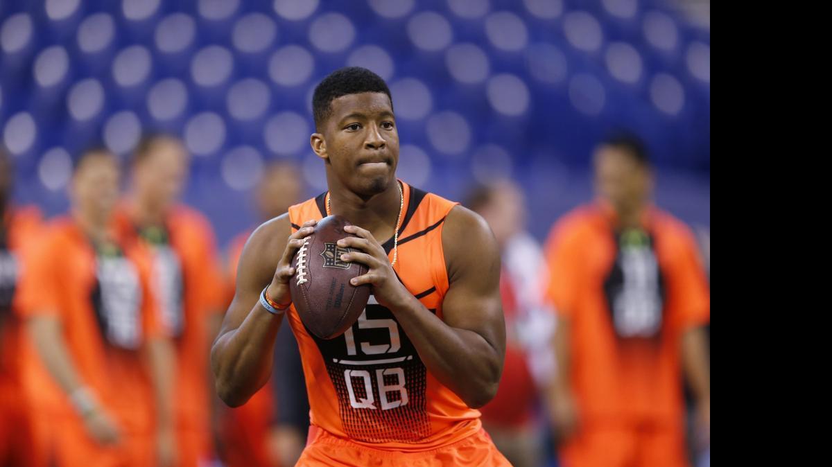 
Former Florida State quarterback Jameis Winston runs a drill at the NFL scouting combine in Indianapolis on Feb. 21. The Sacramento Bee’s Matt Barrows predicts that the Tampa Bay Buccaneers will take Winston as the No. 1 pick in Thursday’s NFL draft.
