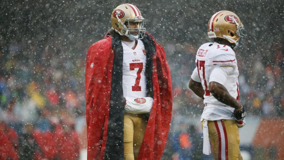 San Francisco 49ers quarterback Colin Kaepernick (7) stands on the sidelines during a game against the Chicago Bears on Dec. 4, 2016, in Chicago.