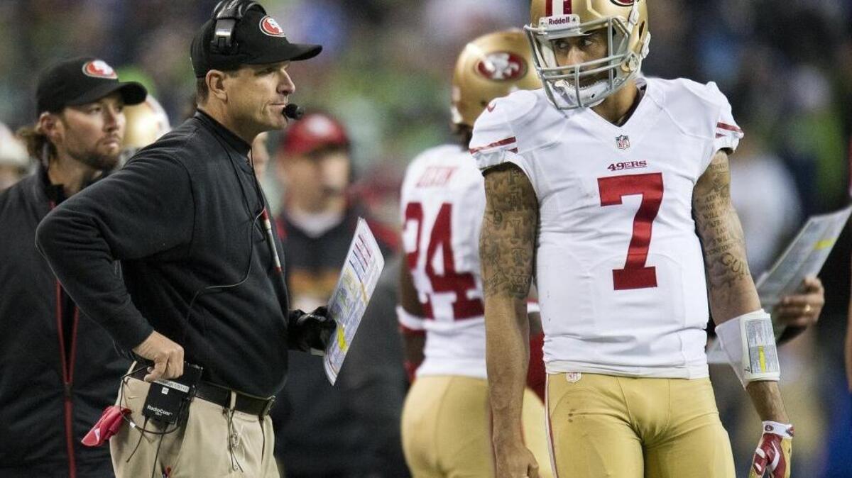Former 49ers coach Jim Harbaugh, left, penned an item in Time maganize about the player he drafted in 2011, quarterback Colin Kaepernick.