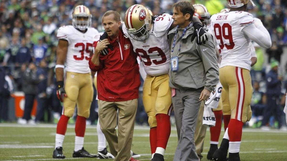 San Francisco 49ers' Ian Williams (93) is taken off the field with an injury in the first half of an NFL football game against the Seattle Seahawks, Sunday, September 15, 2013, in Seattle. The 49ers released Williams, who has dealt with an array of ankle injuries, on Thursday, October 27, 2016.