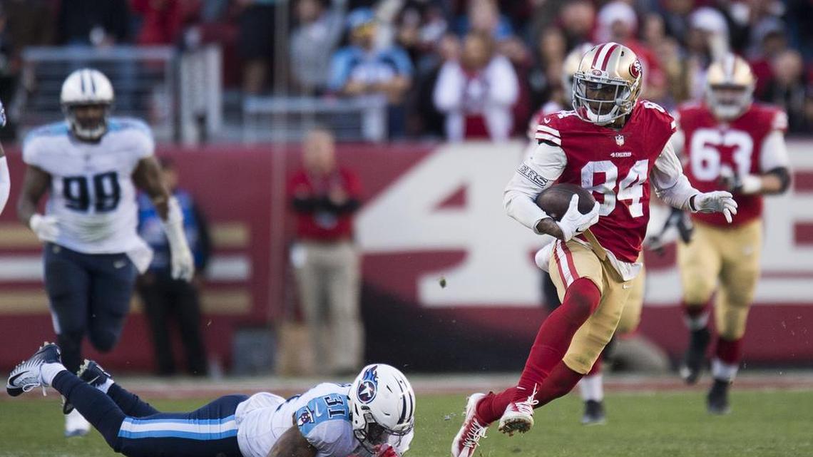 Tennessee Titans' Kevin Byard (31) misses a tackle as San Francisco 49ers' Kendrick Bourne (84) runs 54 yards on the last drive against the Titans in the fourth quarter during a game at Levi's Stadium in Santa Clara, Calif., on Dec. 17, 2017.