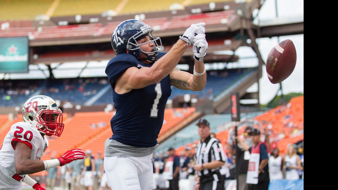 
Fresno State defensive back Malcolm Washington (20) looks on as Rice wide receiver Mario Hull (1) finds a pass out of his reach in the first quarter of the Hawaii Bowl NCAA college football game, Wednesday, Dec. 24, 2014, in Honolulu. 
