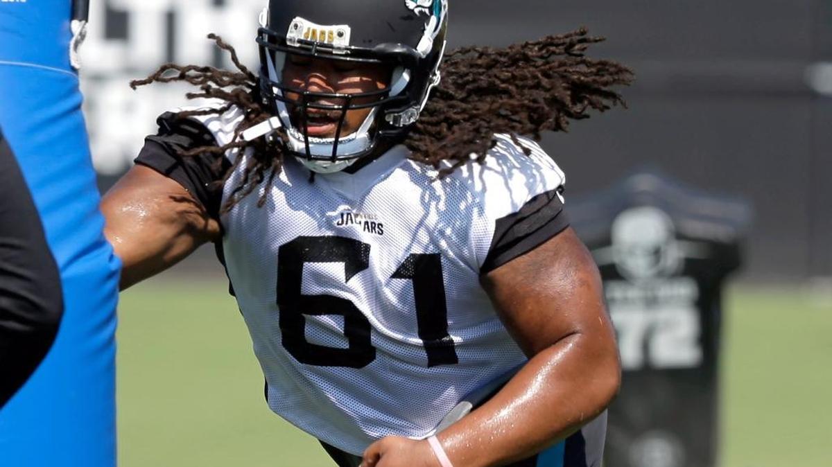 Jacksonville Jaguars defensive tackle Sheldon Day goes through a drill during an NFL football practice, Friday, June 3, 2016, in Jacksonville, Fla.