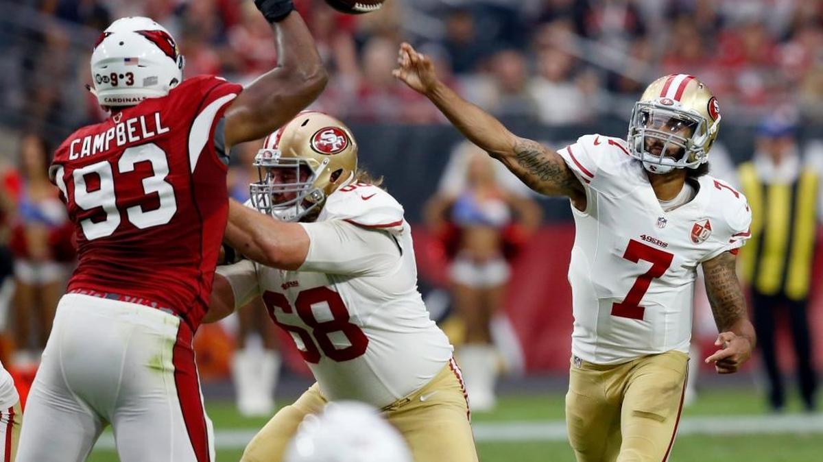 San Francisco 49ers quarterback Colin Kaepernick (7) throws over Arizona Cardinals defensive end Calais Campbell (93) during the first half of an NFL football game, Sunday, Nov. 13, 2016, in Glendale, Ariz.
