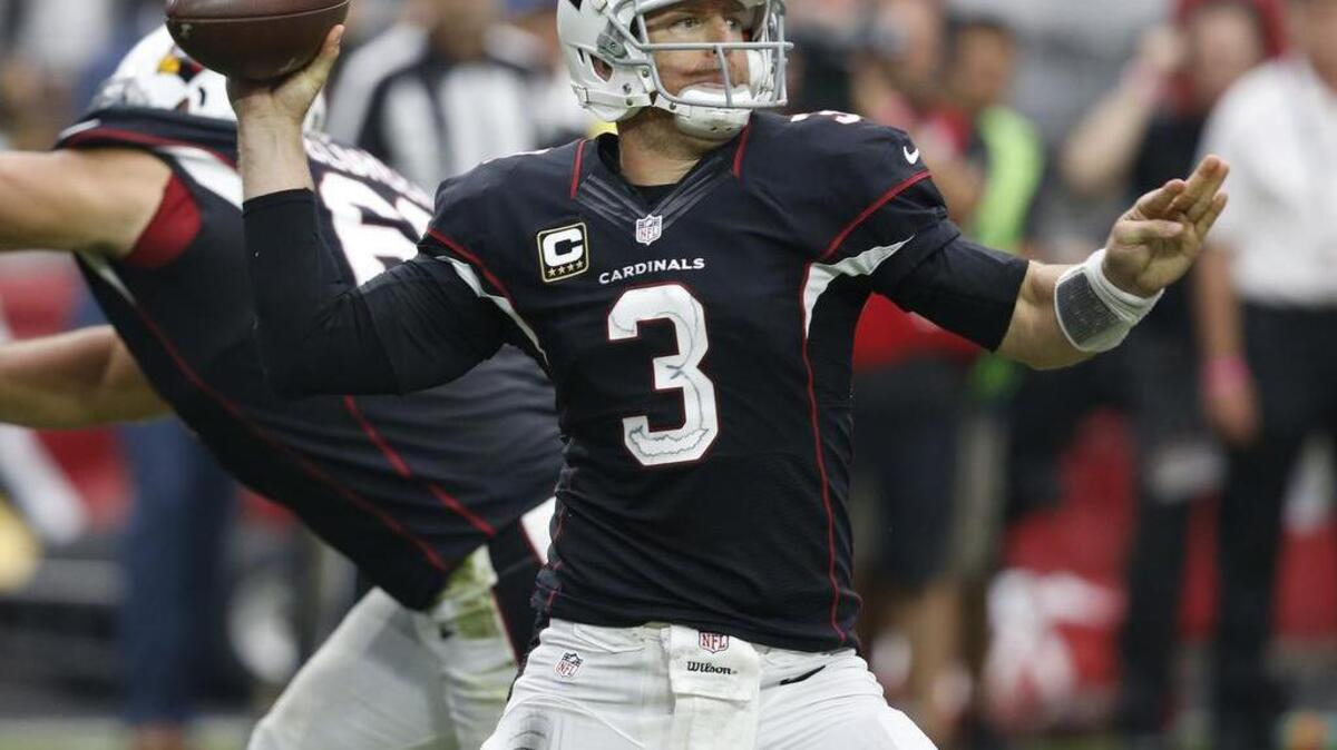 Arizona Cardinals quarterback Carson Palmer (3) throws against the Los Angeles Rams during the first half of an NFL football game, Sunday, Oct. 2, 2016, in Glendale, Ariz.