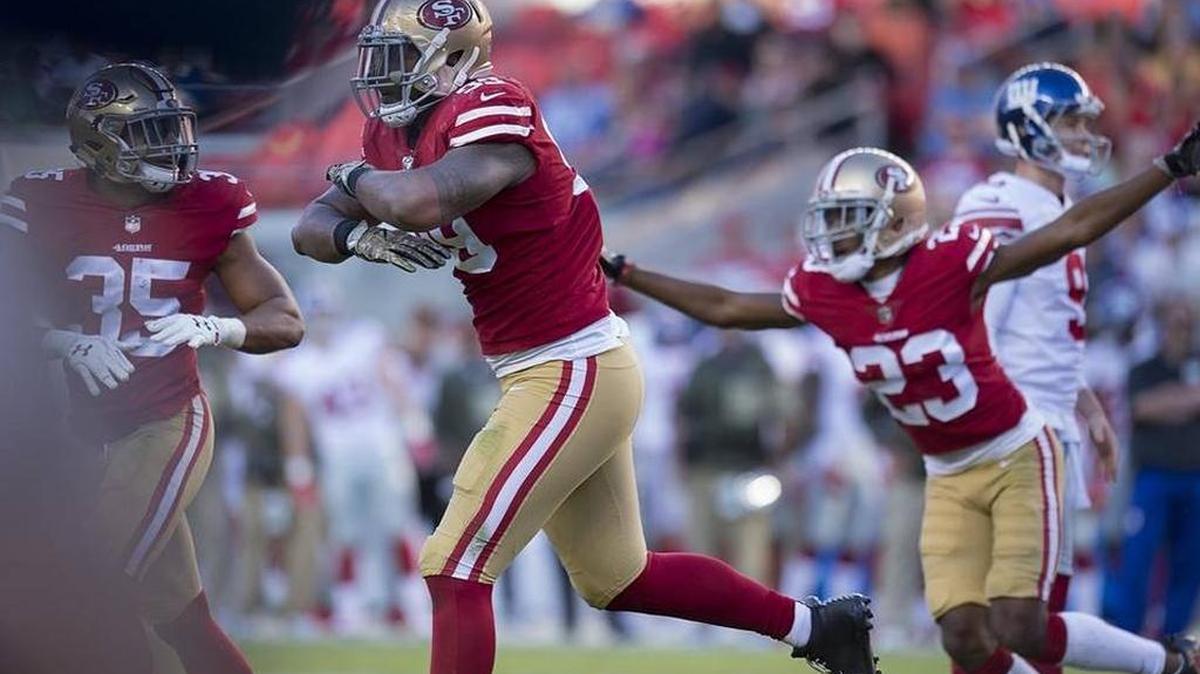 49ers defenders Eric Reid, DeForest Buckner and Ahkello Witherspoon celebrate a missed field goal against the New York Giants.