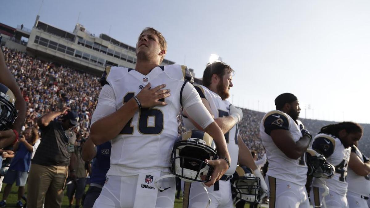 Los Angeles Rams quarterback Jared Goff sings the national anthem prior to a preseason NFL football game against the Kansas City Chiefs, Saturday, Aug. 20, 2016, in Los Angeles.