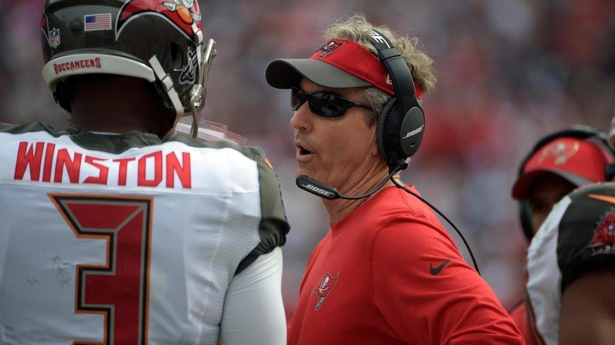 Tampa Bay Buccaneers offensive coordinator Dirk Koetter talks to quarterback Jameis Winston (3) during an NFL football game against the Dallas Cowboys Sunday, Nov. 15, 2015, in Tampa, Fla.