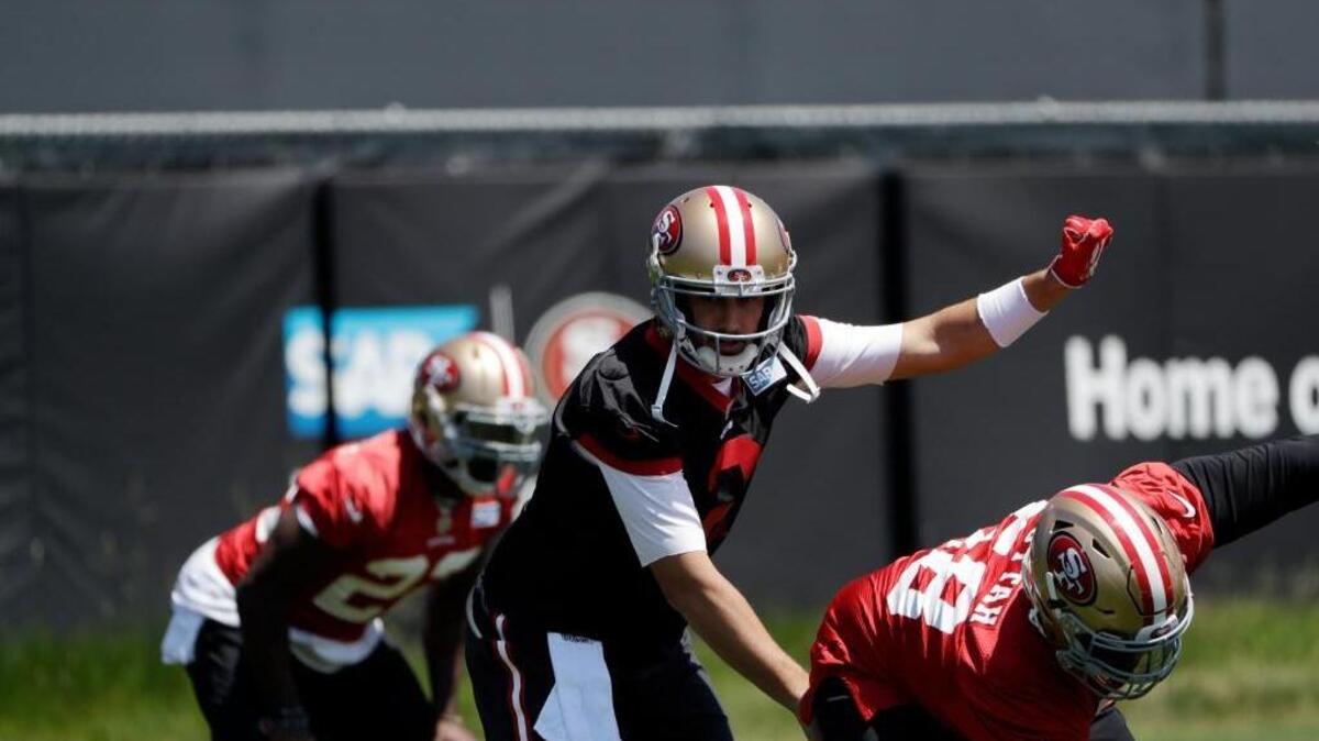 Quarterback Brian Hoyer runs the 49ers’ offense during an organized team activity at its training facility on May 23 in Santa Clara.