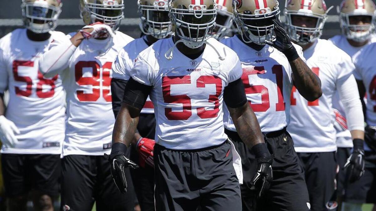 San Francisco 49ers' NaVorro Bowman (53) and other linebackers line up for a drill during practice at the team's NFL football facility in Santa Clara, Calif., Tuesday, May 17, 2016.