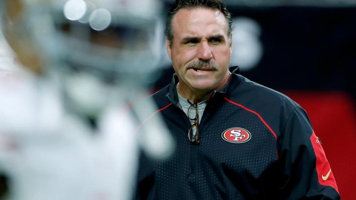 
San Francisco 49ers head coach Jim Tomsula watches his team prior to an NFL football game against the Arizona Cardinals, Sunday, Sept. 27, 2015, in Glendale, Ariz. 
