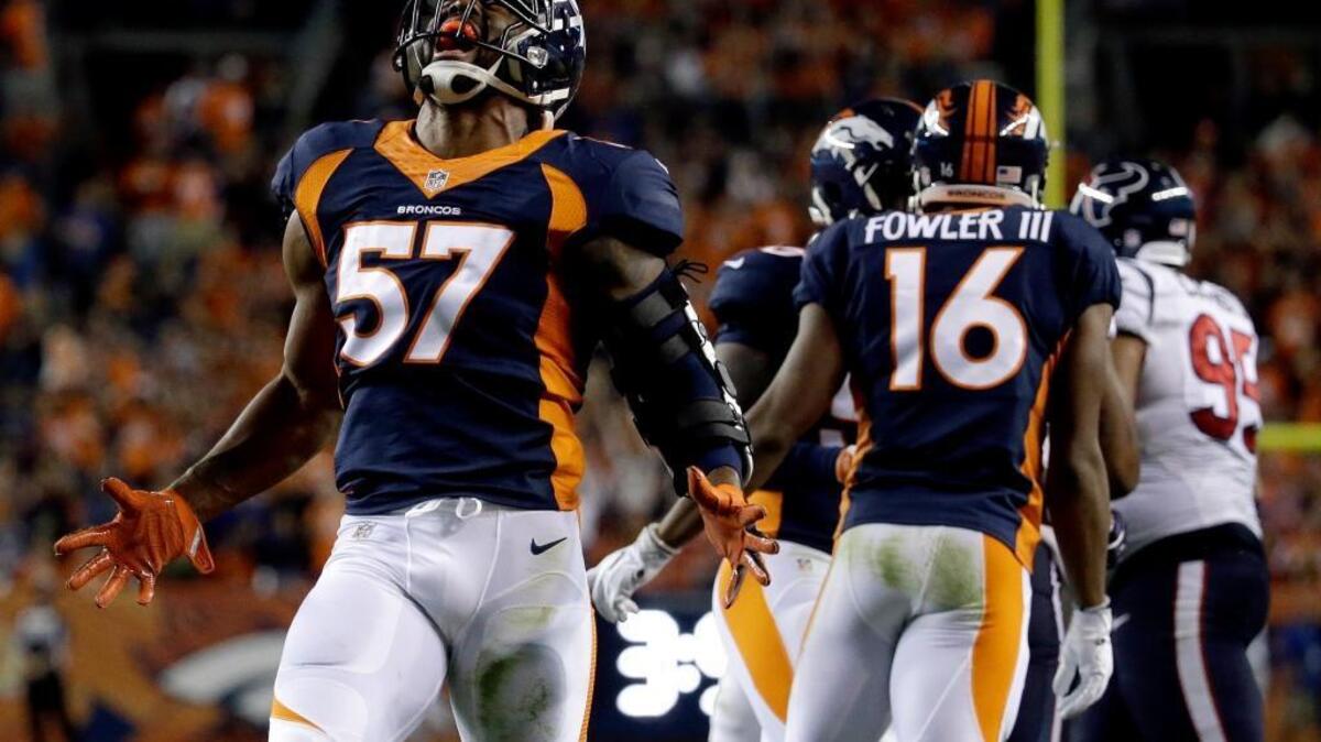 Denver Broncos linebacker Dekoda Watson (57) celebrates a defensive stop against the Houston Texans during the first half of an NFL football game, Monday, Oct. 24, 2016, in Denver.