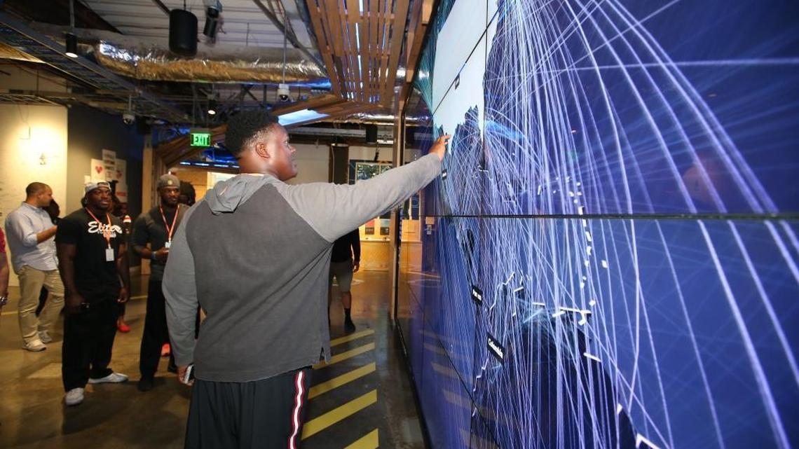 49ers rookie offensive tackle Norman Price checks out an interactive map at Facebook headquarters in Menlo Park, Calif.