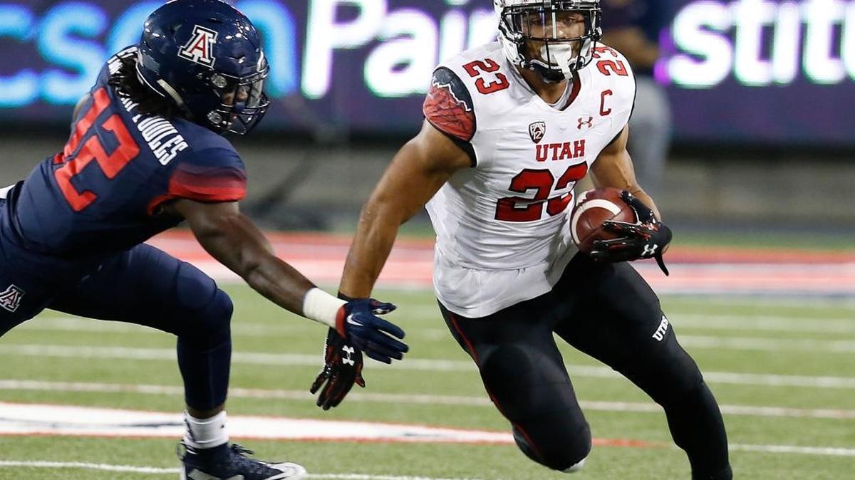 Utah running back Devontae Booker (23) during the first half of an NCAA college football game against Arizona, Saturday, Nov. 14, 2015, in Tucson, Ariz.