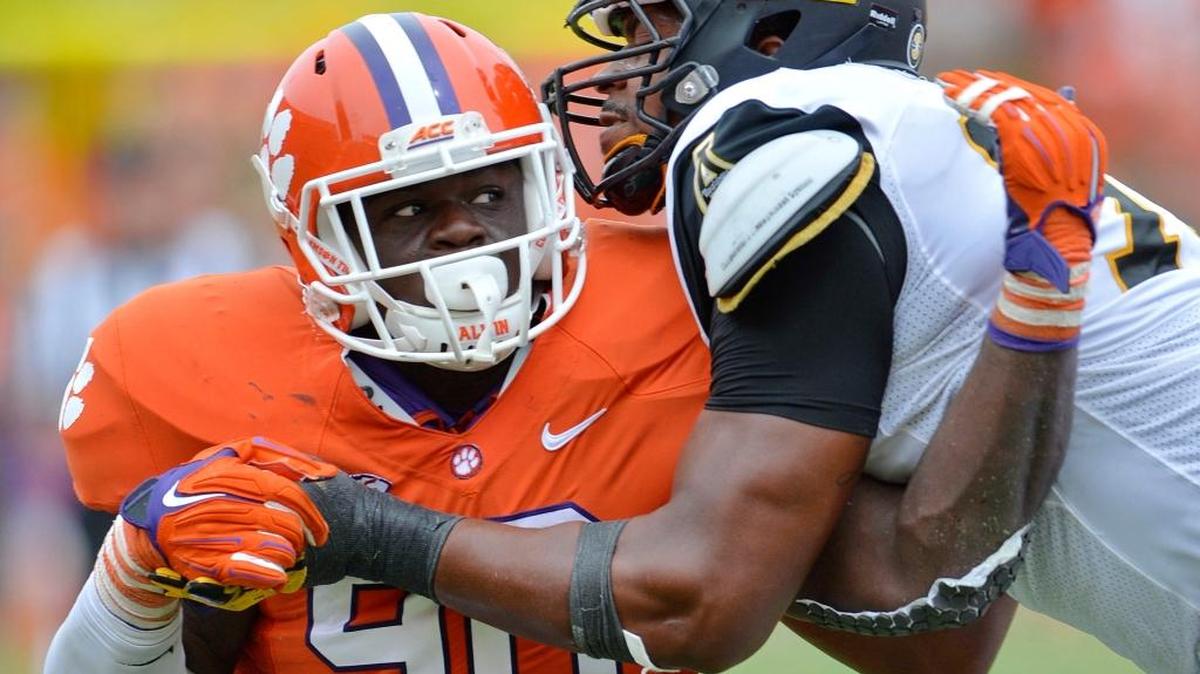 In this Sept. 12, 2015, file photo, Clemson's Shaq Lawson (90) rushes against Appalachian State's Davante Harris during the second half of an NCAA college football game in Clemson, S.C.