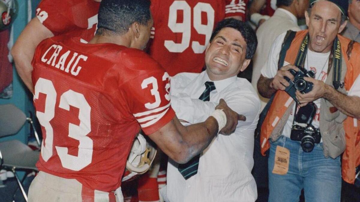 Eddie DeBartolo, celebrating with running back Roger Craig after the San Francisco 49ers, owned by DeBartolo, won the Super Bowl in 1989. DeBartolo is going into the Hall of Fame, but his former team is not playing in the preseason game that is part of induction celebrations.